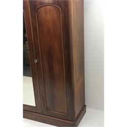  Victorian mahogany triple wardrobe, projecting cornice, three doors, single full length mirror, fitted interior including five linen and three standard drawers, plinth base, W190cm, H207cm, D57cm  