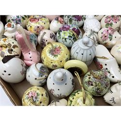 Large collection of ceramic pomanders, to include examples modelled as animals, floral examples etc