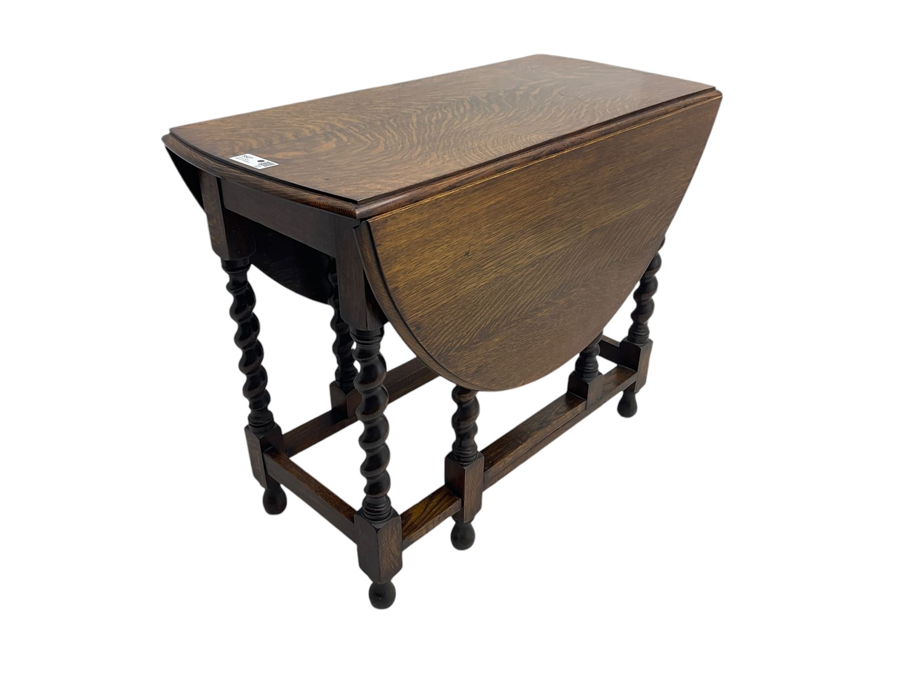 20th century oak drop-leaf dining table on spiral turned supports 