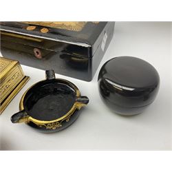 Russian black lacquer tray decorated with birds upon branches with berries, decorated with gilding, together with similar gilded Russian boxes and black lacquer ashtray and a quantity of other boxes to include agate example with mother of pearl inlay, inlaid wood examples etc