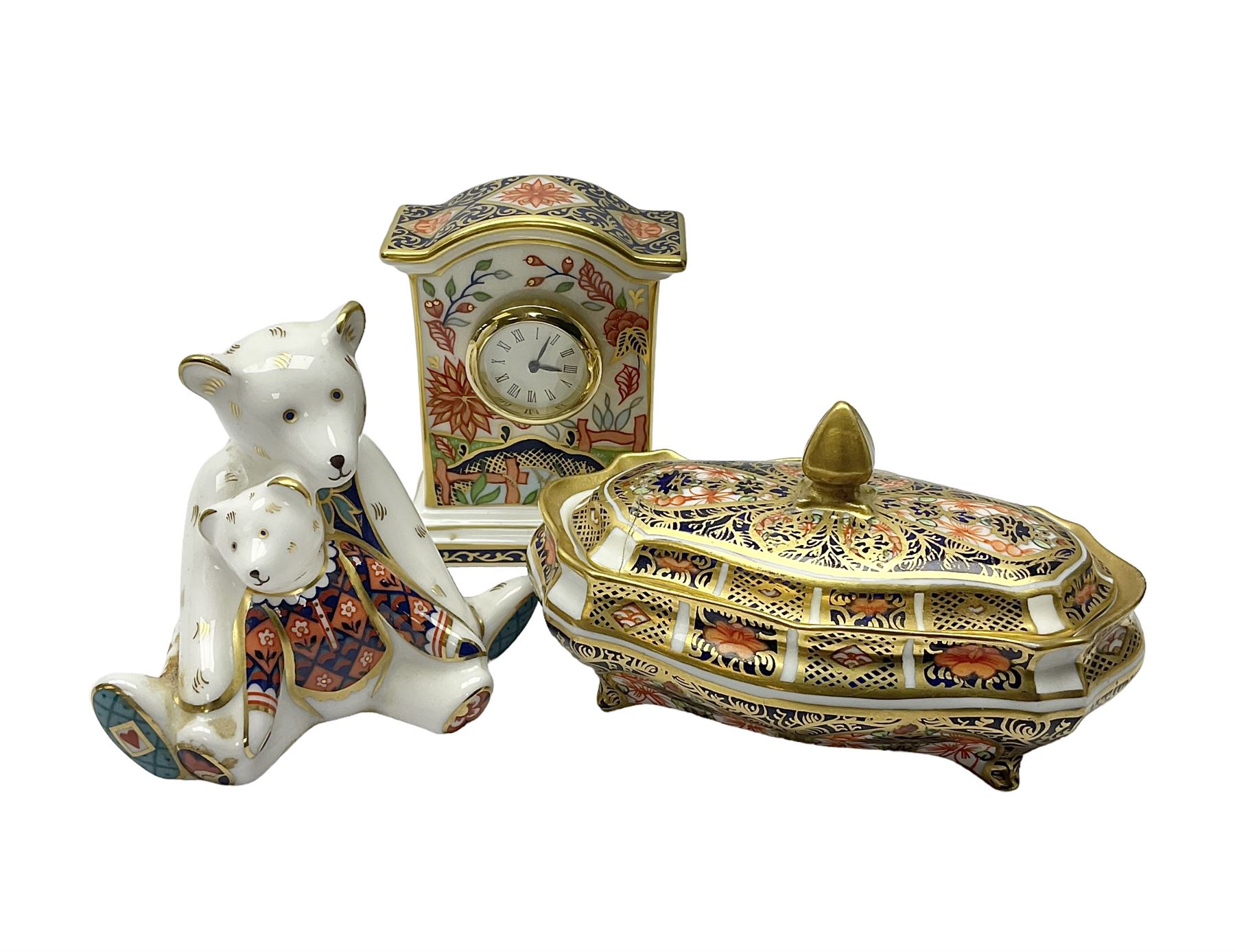 Royal Crown Derby Haiku pattern miniature clock, together with 1128 Imari pattern trinket box with cover and teddy bear figure, all with printed marks beneath   
