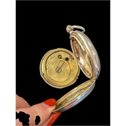 Late Victorian silver full hunter pocket watch by Tho Russell & Son no. 82844, with white enamel dial and subsidiary seconds dial, the front cover with blank cartouche, hallmarked Chester 1891