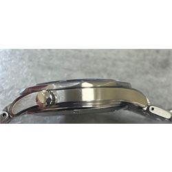 Omega Seamaster gentleman's stainless steel automatic chronometer wristwatch, Ref. 168.1623, Cal. 1120, blue wave dial, with luminous dot and baton hour markers with date aperture, unidirectional rotating blue bezel, on Omega stainless steel bracelet, with fold-over clasp, boxed