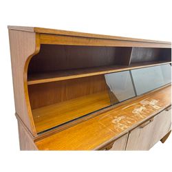 Mid 20th century teak sideboard with sliding glass panels 