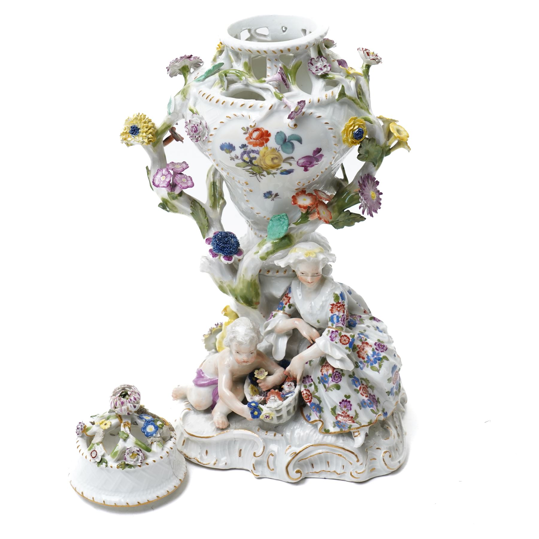19rh century German porcelain centrepiece with pierced cover decorated with applied flowers and figures at the base H31cm,  near pair of scent flasks with applied flowers and a two-handled vase