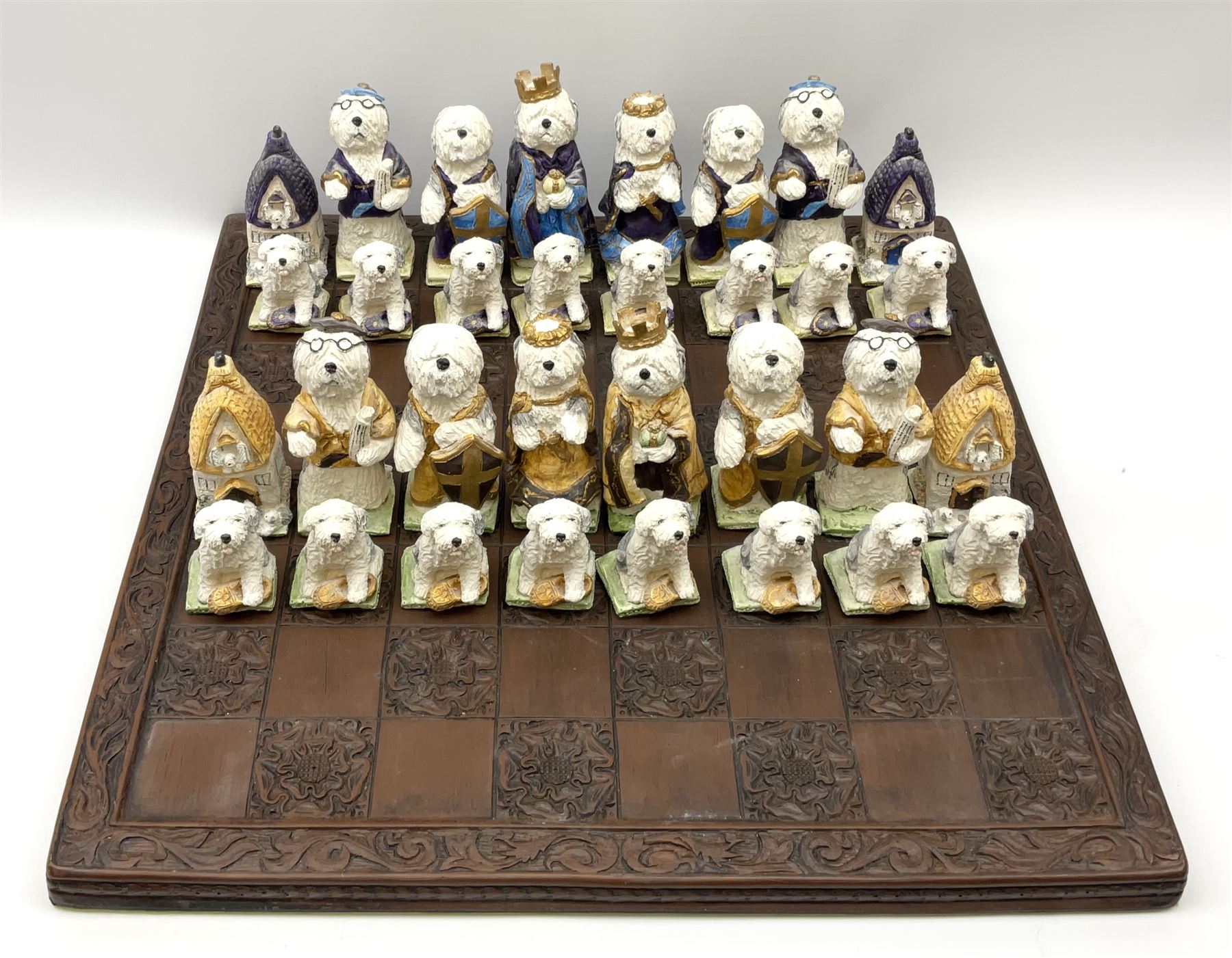 A Sylvia Smith chess set, the pieces modelled as anthropomorphic Old English Sheepdogs