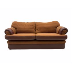 Peter Silk of Helmsley two seat sofa, upholstered in brown leather and fabric, feather back cushions, reversible cushion option