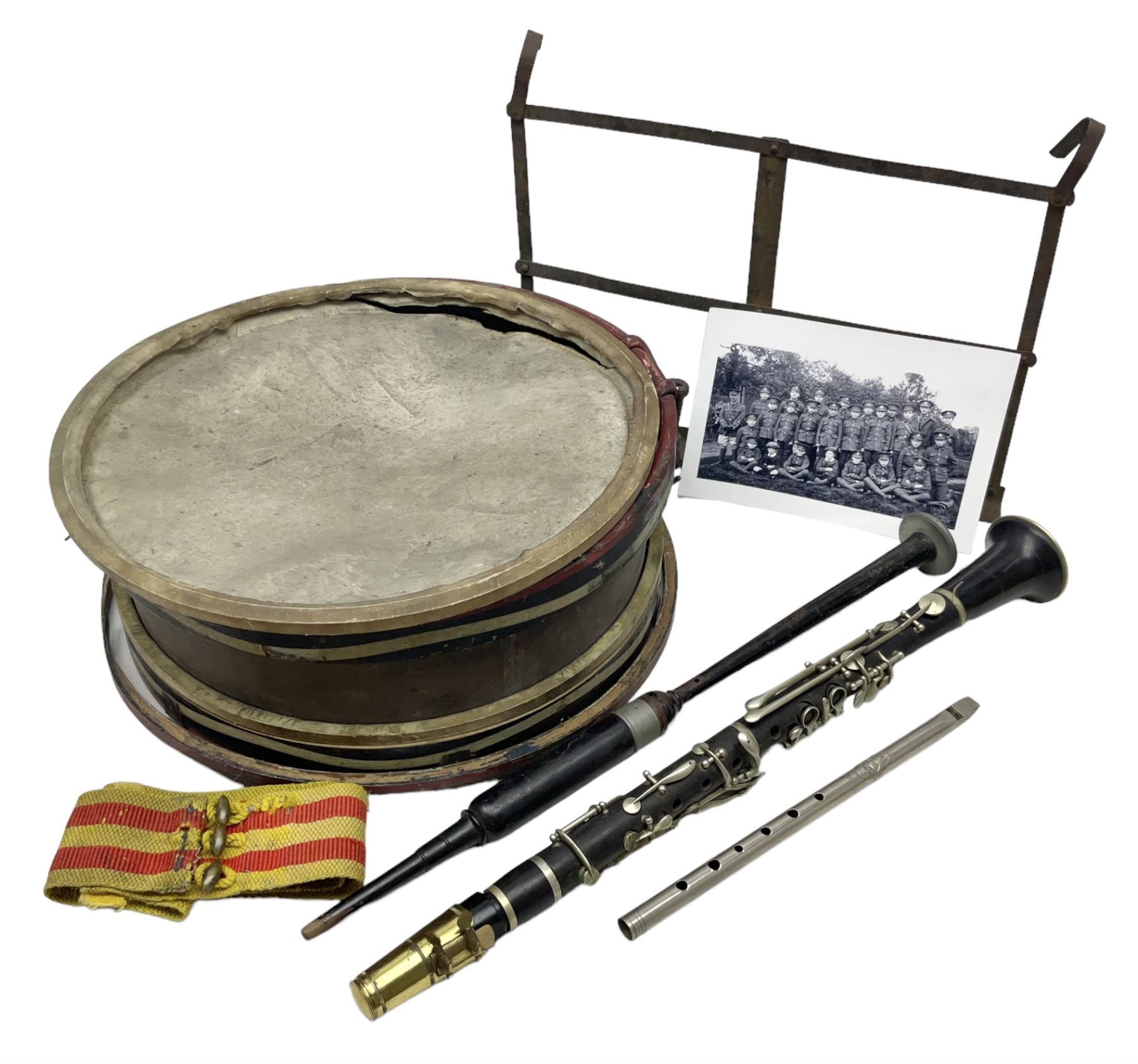 Disassembled early 20th century Boys Brigade snare drum D37cm with copy WW1 period photograph of the Kirbymoorside Boys Brigade; early 20th century hardwood clarinet; bagpipes chanter; and Dulcet E-flat penny whistle