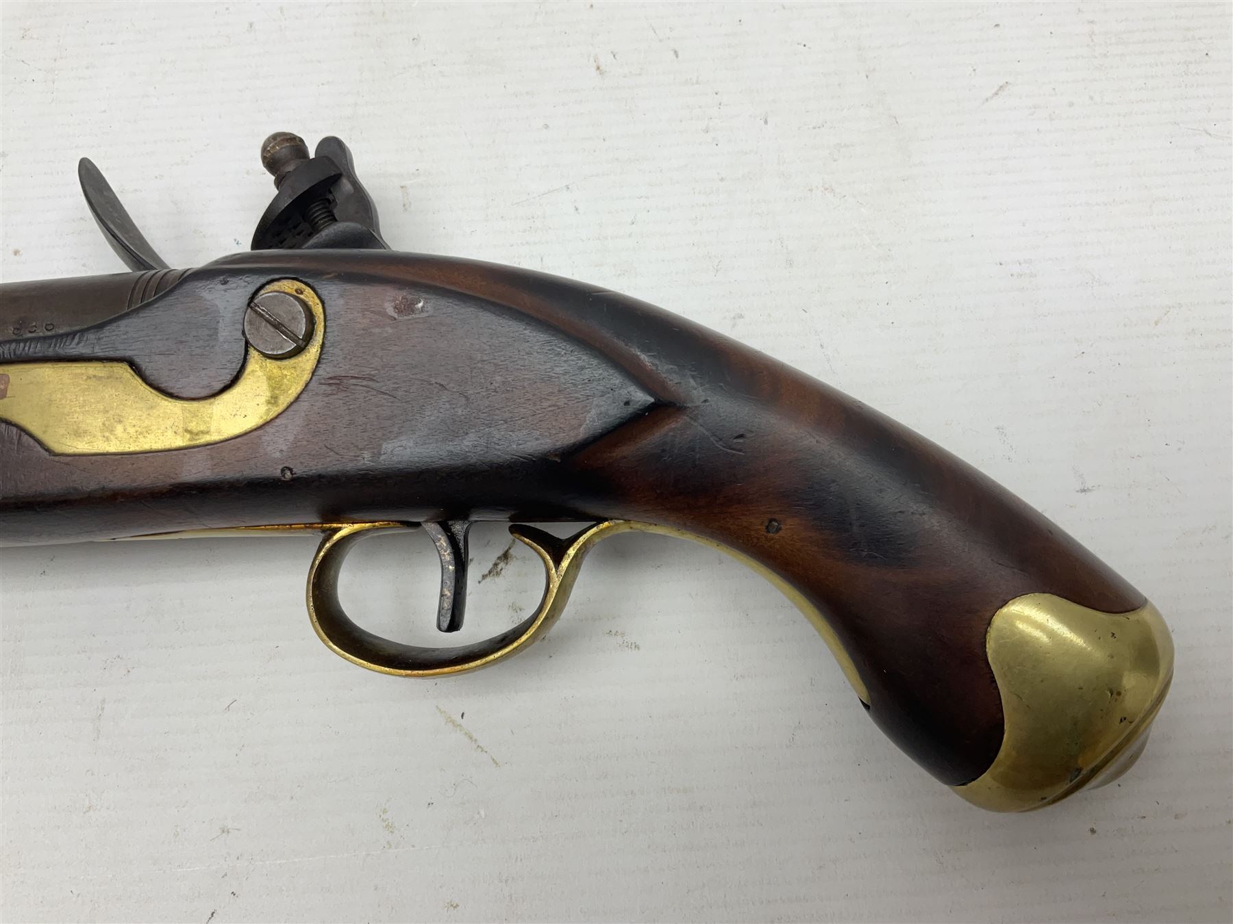 Modern non-firing reproduction Tower flintlock pistol marked with crowned GR and Tower to the lock, brass skull crusher butt and fittings L40cm overall; another Indian/Moorish reproduction flintlock pistol with mother-of-pearl inlay; and a modern die-cast replica Colt style revolver (3)