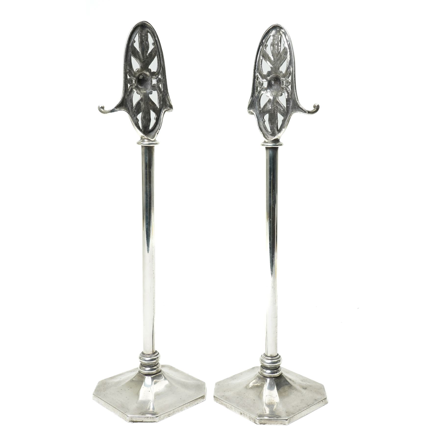 Pair of silver plated companion stands with pierced oval finials on square bases H53cm