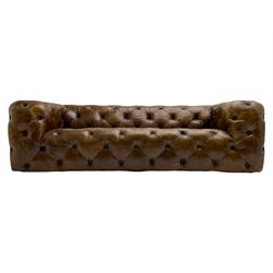 Three seat Chesterfield type club sofa, upholstered in deeply button Brazilian tan brown leather