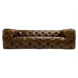 Three seat Chesterfield type club sofa, upholstered in deeply button Brazilian tan brown leather