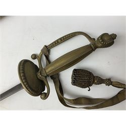 19th century English courtsword, the 78.5cm decorative oval section steel blade marked Boulter, Hepburn & Watts 28 George St. Hanover Sqe. W, brass hilt with shell guard, beaded knucklebow and grip and urn shaped pommel with gold bullion knot; in brass and leather scabbard L95cm overall