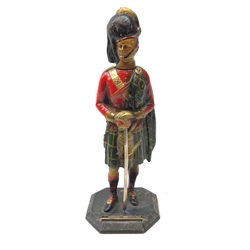 20th century spelter table lighter painted in Scottish Highland Regiment colours, on octagonal base, with lifting head H24cm  