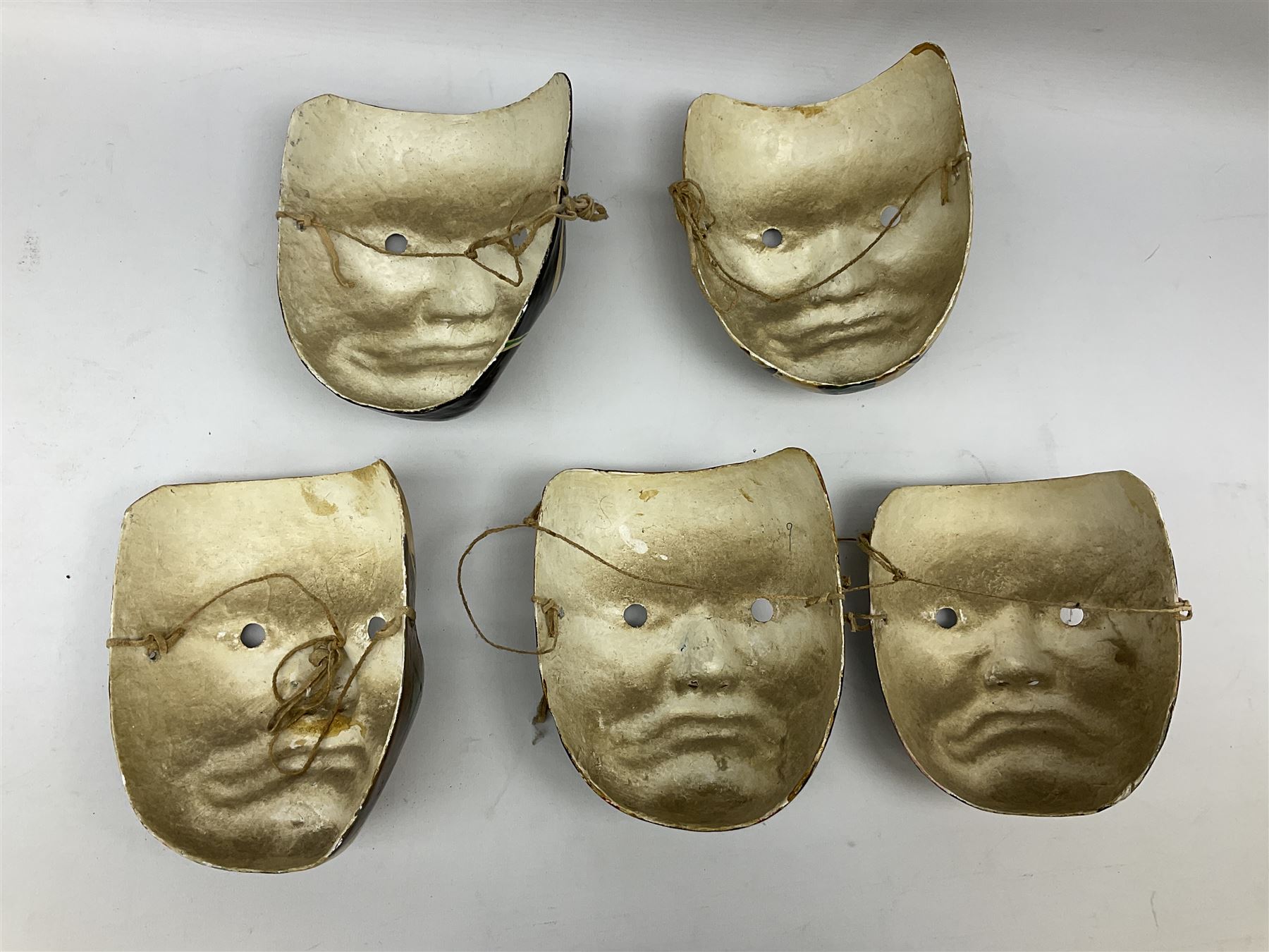 Five Japanese theatre / opera masks, the papier-mâché traditionally painted in the Noh Kabuki style, L18cm