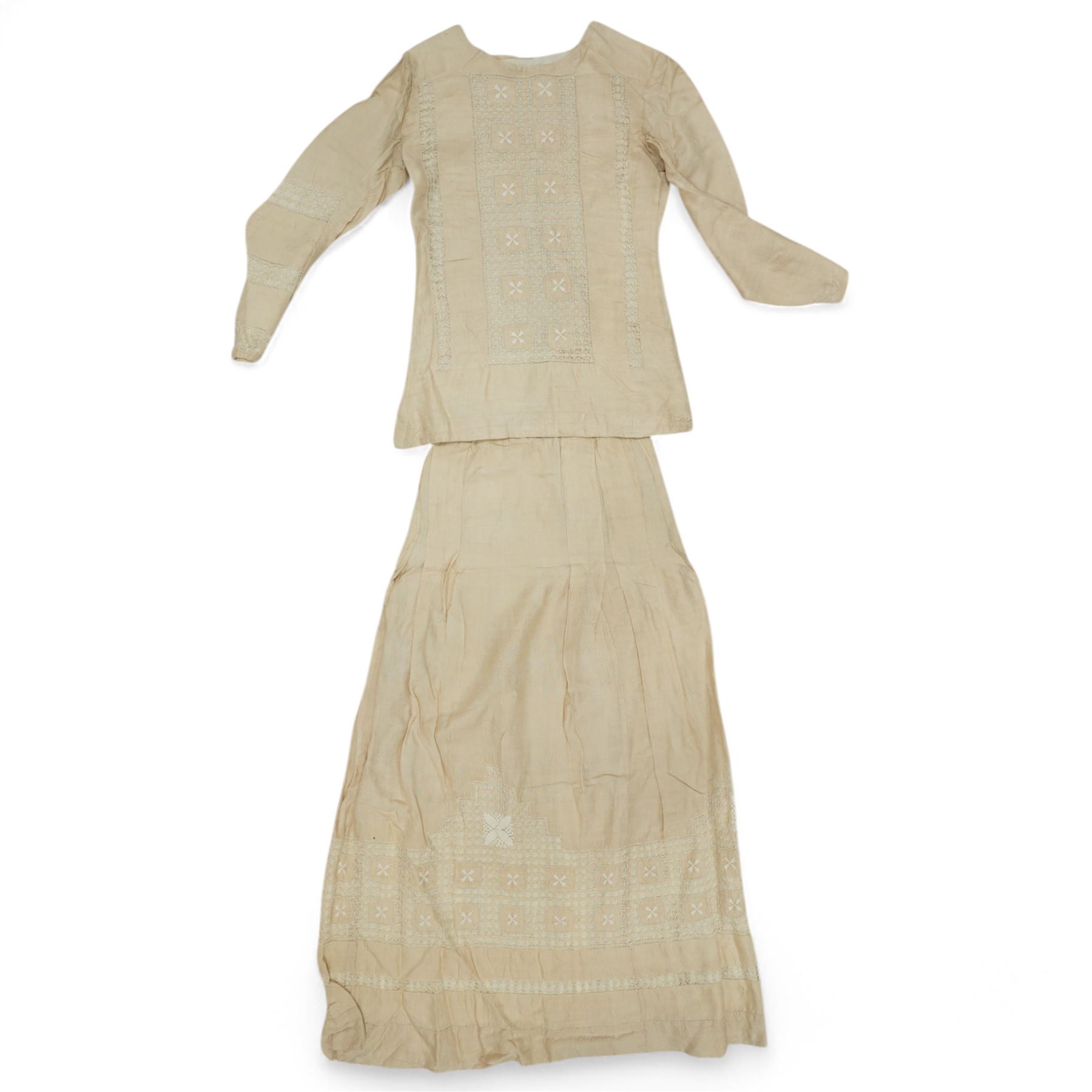 Two Edwardian childrens or ladies bodices and skirts, in cream with panels of contrasting  lace detailing (2)