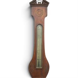 Three mahogany wheel barometers, each with silvered dial, thermometer and hygrometer, two with inlaid decoration, one with architectural pediment and one with swan-neck pediment 