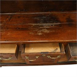 18th century oak dresser with rack, the three-tier plate rack with dentil-carved cornice, the plate shelves with moulded edge and wrought metal hooks, the base fitted with three drawers with brass swan-neck handles over three panelled cupboards, lower moulded edge on stile supports
