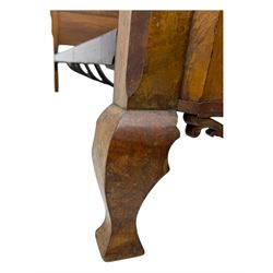 Mid-20th century walnut single bedstead, high shaped headboard, footboard with turned finials and scrollwork carvings, complete with 'Vono' iron frame, raised on cabriole supports