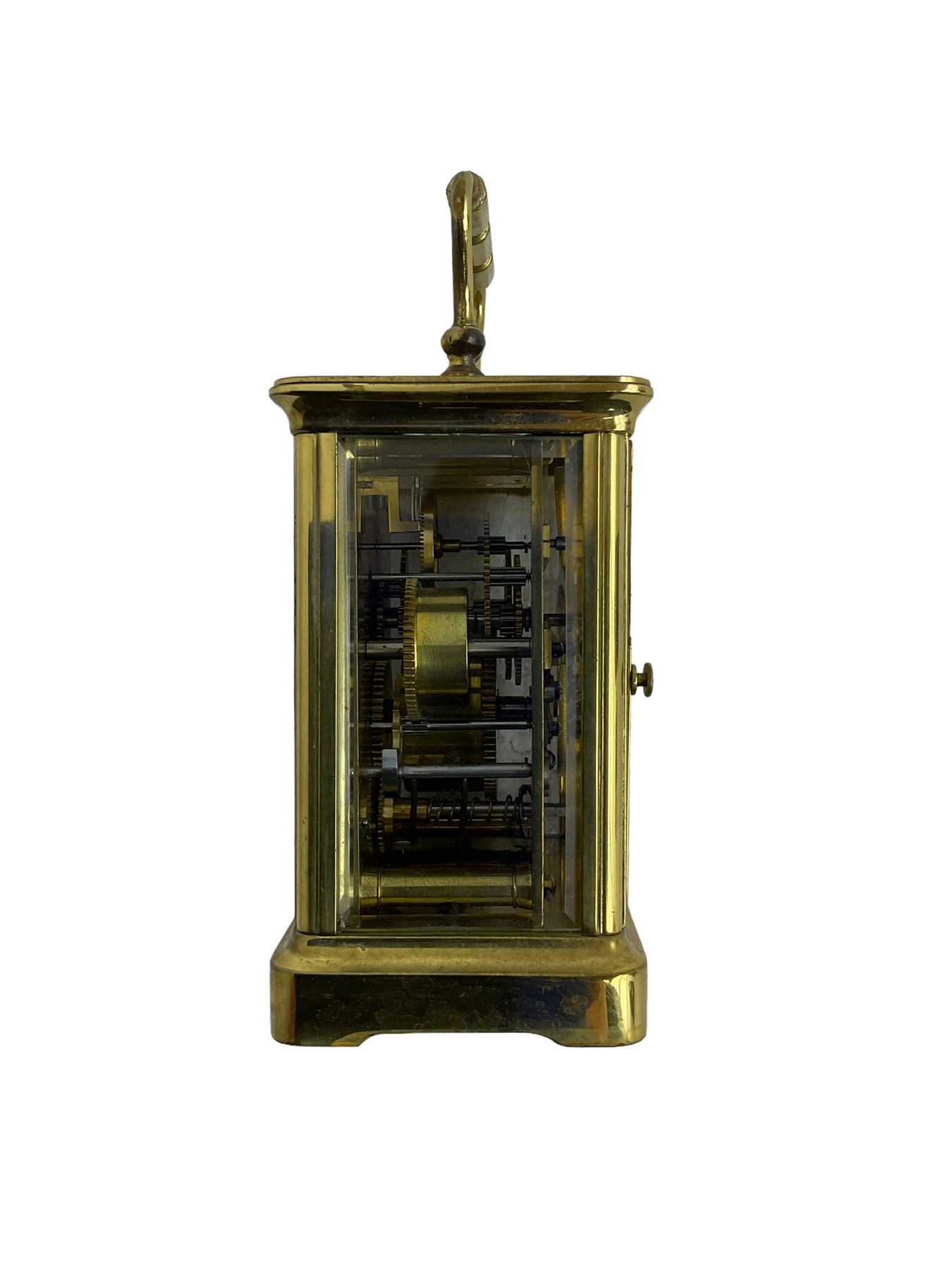 French - 19th century 8-day carriage clock with alarm, corniche case with an enamel dial, Roman numerals, minute markers and alarm setting disc, with a cylinder platform escapement, sounding the alarm on a bell. With key.