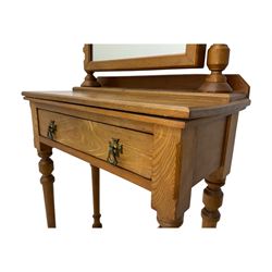 Late 19th century ash dressing table, rectangular mirror supported by two turned columns with carved finials, single drawer with brass handles, raised on turned supports