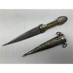 Caucasian qama or kindjal dagger, the 15cm pointed double edged blade with centre fuller and two-piece horn grip;  in nickel plated scabbard with panels of figures and script L28.5cm overall; and eastern knife with 20.5cm curving blade and decorative horn grip; in leather covered scabbard (2)