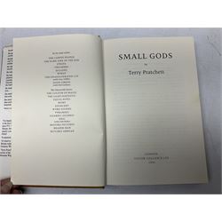 Collection of twenty-three hardback Terry Pratchett books, comprising approximately eighteen first editions including The Fifth Elephant signed & inscribed by Pratchett, all with dustjackets