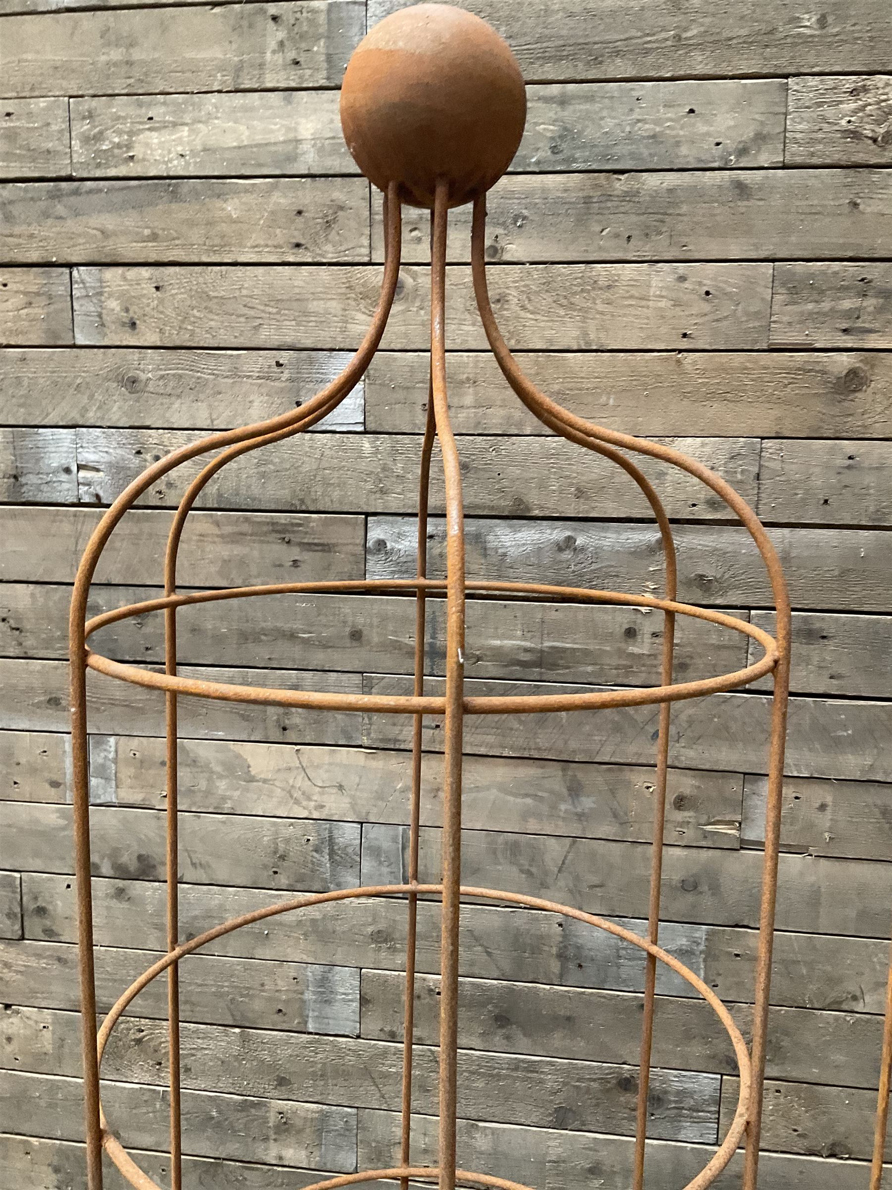 Pair of Country House wrought iron garden obelisks with ball finial, raise in four tiers