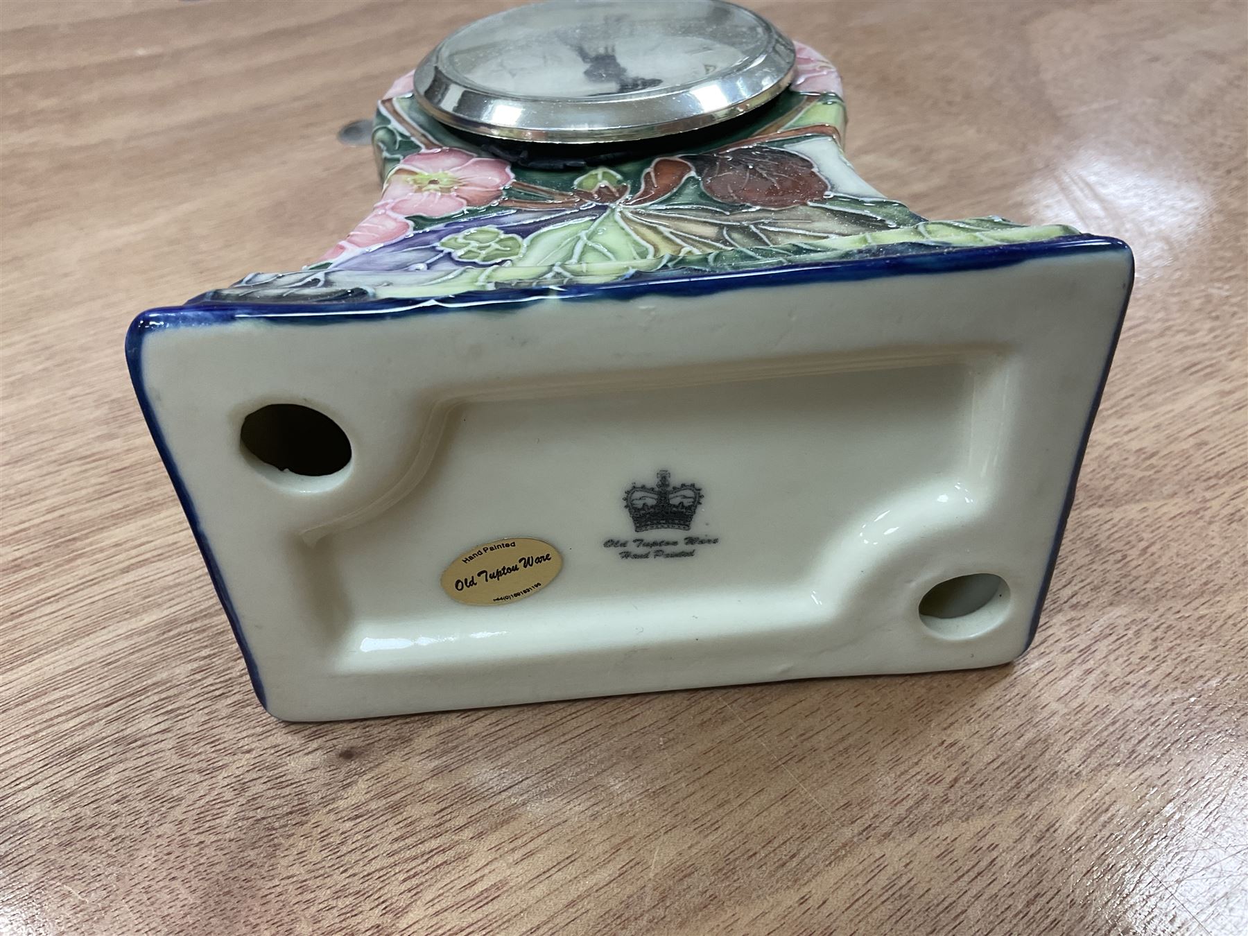 Old Tupton Ware floral decorated mantle clock, Wade Festival jug, Winsor tea wares and other ceramics, together with a collection of silver plate including blue glass lined salts, cutlery sets etc, two boxes 