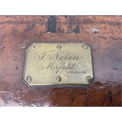 Leather shotgun case, the red baize lined interior with the trade labels of Westley Richards & Co., London, a brass plaque inscribed 'T Nevin, Mirfield, Yorkshire' to cover, with key, case to fit barrel 76cm (30 inches)  
