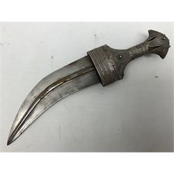 Omani Khanjar dagger, the 19cm curved blade with pronounced medial rib to either side, waisted hilt with dome shaped pommel and silver covered horn grip decorated with filigree bands, floral motifs and beadwork; in an intricately filigree decorated silver and leather scabbard with silver rings woven into the belt mount and fitted with original silver thread-work belt L34cm overall belt length 94cm