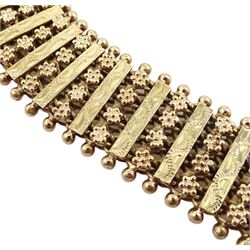 9ct gold  bar and floral design fancy link bracelet, London import marks 1979, approx 29.95gm