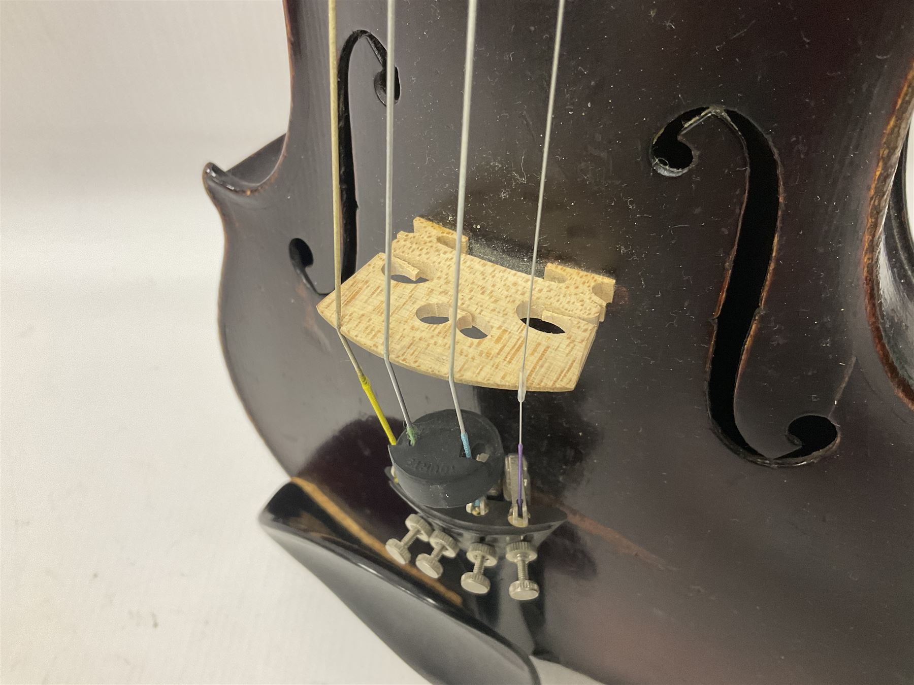 Neuner & Hornstiner early 20th century half size violin c1900, two piece maple back and ribs with a spruce top in a later ridged carrying case, no bow Length 57cm