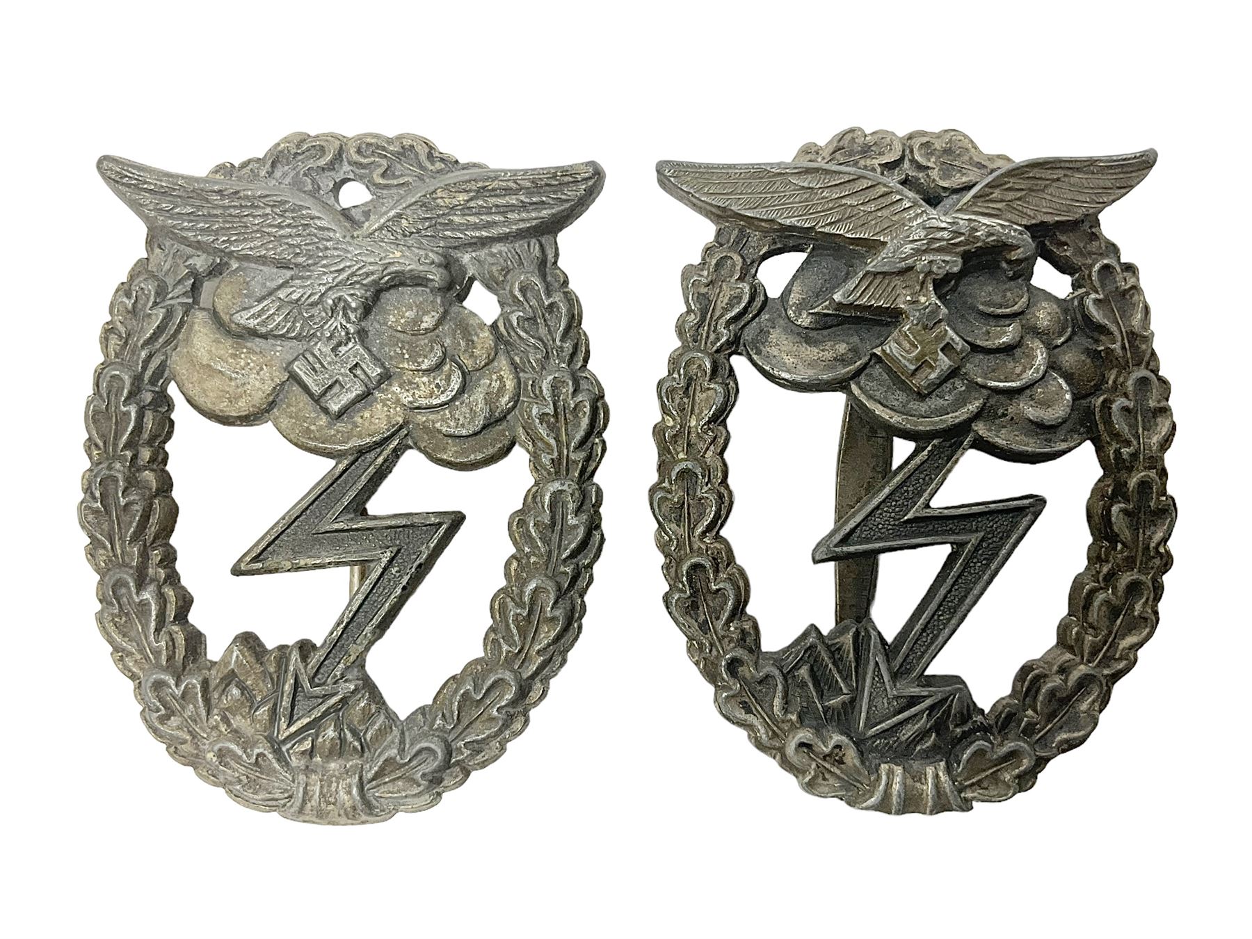 Two WW2 German Luftwaffe Ground Assault/Combat badges - one with flat pin and maker's mark M.u.K.; the other unmarked with round pin (2)