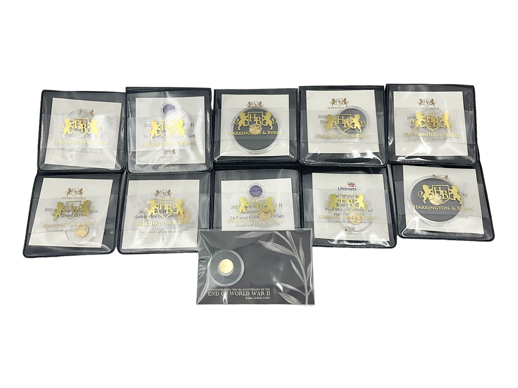 Eleven Queen Elizabeth II miniature gold coins, each being 0.5 grams of 24 carat gold, including Tristan da Cunha 2020 'Laurel', Solomon Islands 2020 '80th Anniversary of the Battle of Britain' etc, all with certificates