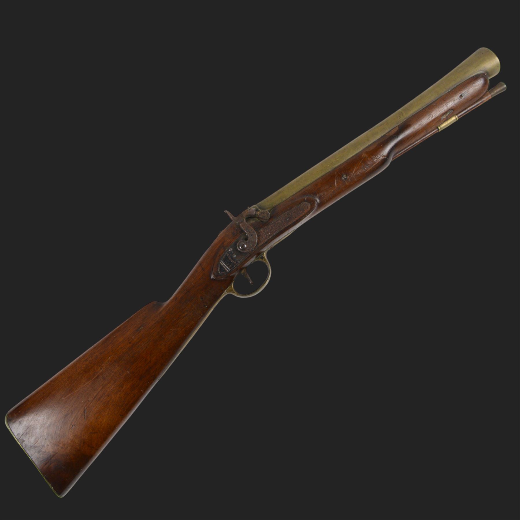 English flintlock blunderbuss, the 38cm brass barrel with proof marks and London to the top, with brass tip ramrod below, the lock engraved Morris, walnut stock with brass butt plate, overall L79cm