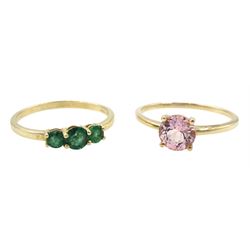 Gold three stone emerald ring and a gold single stone pink danburite ring, both hallmarked 9ct