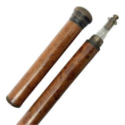 19th century malacca walking cane, the screw threaded domed cover opening to reveal vacant recess, above a further screw threaded opening revealing a removable glass vial with stopper, glass vial L41cm, cane L89.5cm