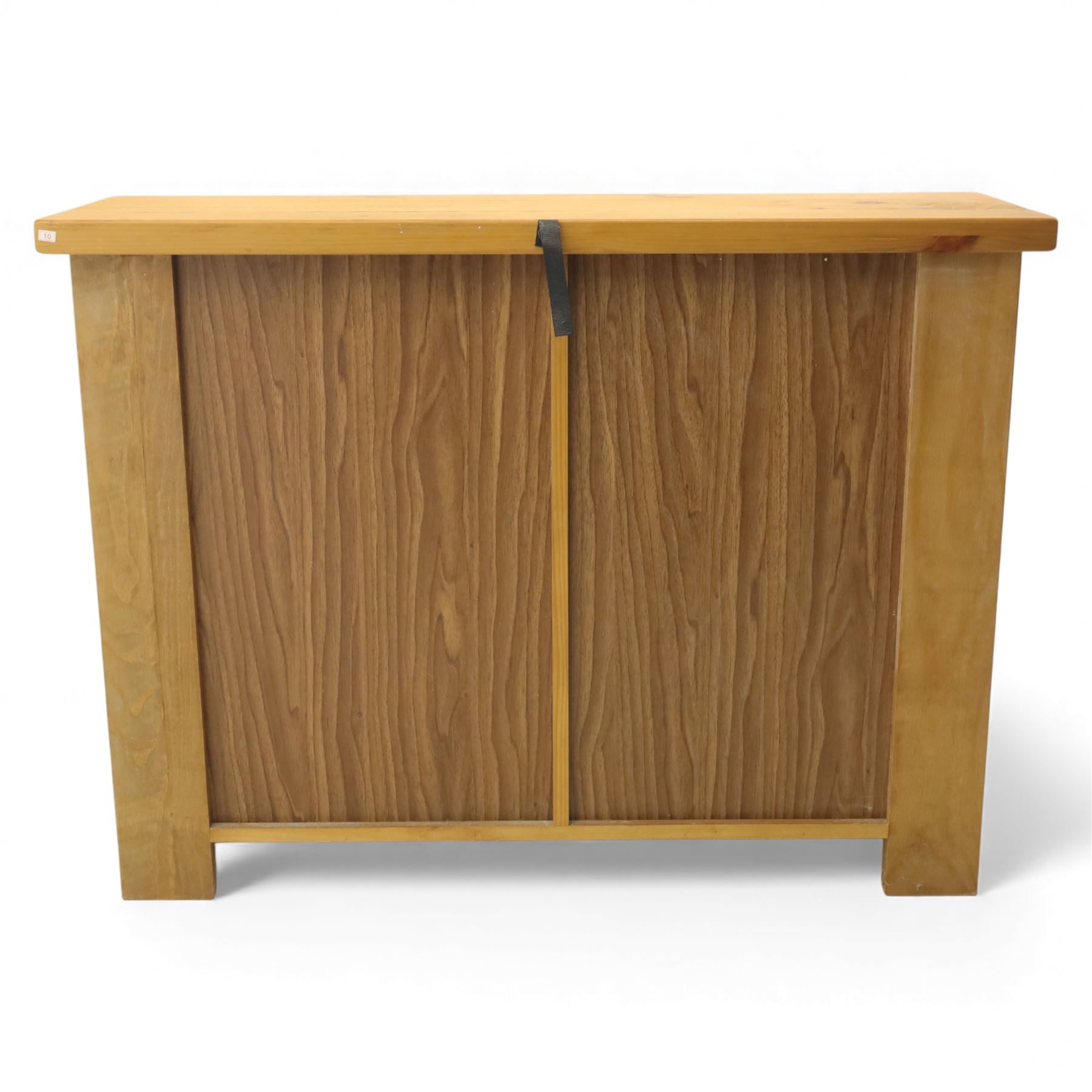 Contemporary pine side cabinet, rectangular top with moulded edge, fitted with three drawers with brushed metal handles alongside a single cupboard door with round metal knob, plain sides, raised on square block feet