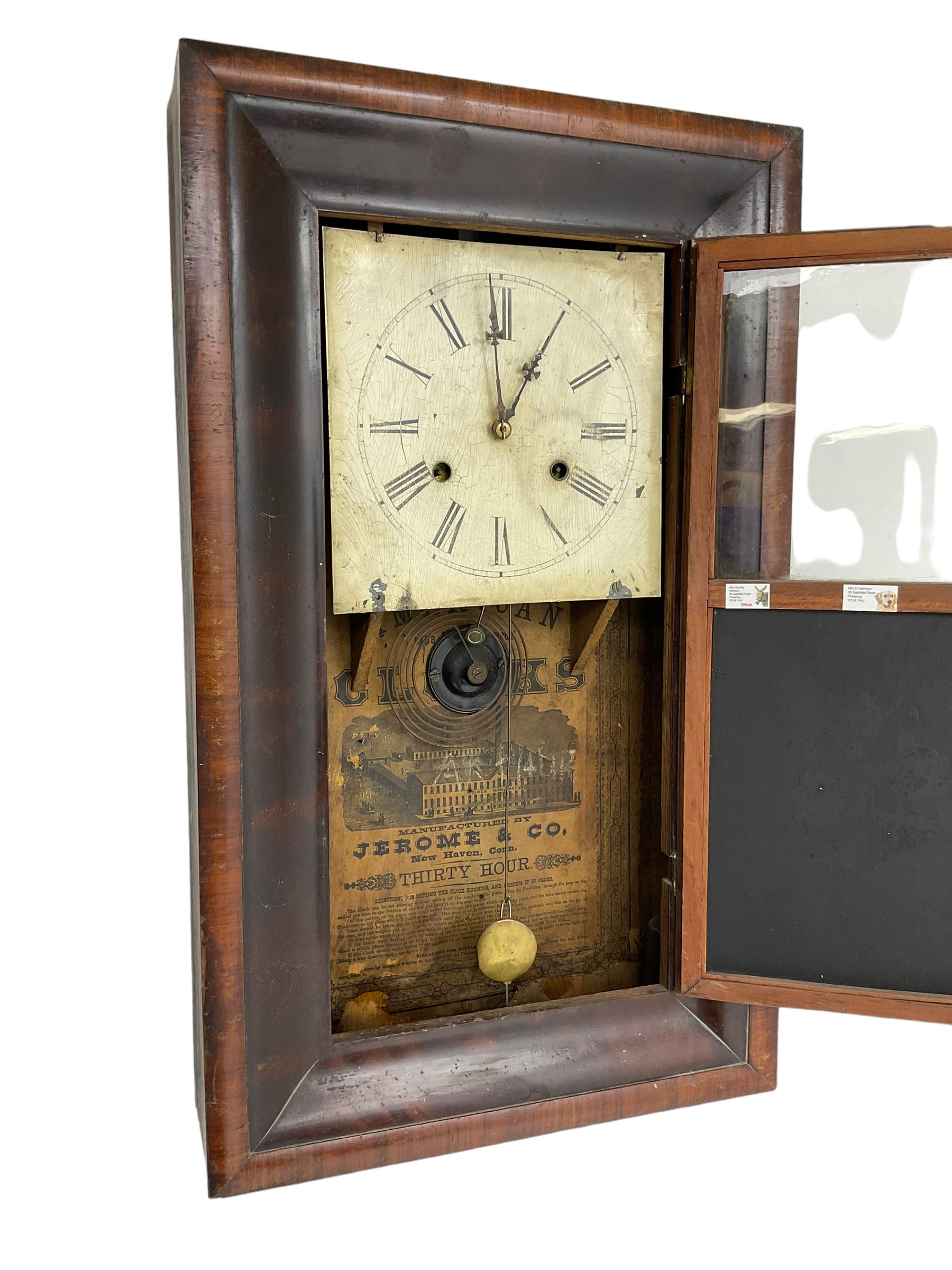 Jerome & Co - American late 19th century 30 hr weight driven mahogany wall clock, with deep ogee moulding and glazed door with a painted tablet,
Painted dial with Roman numerals and Maltese cross hands, twin train movement, striking the hours on a coiled gong. With weights and pendulum.