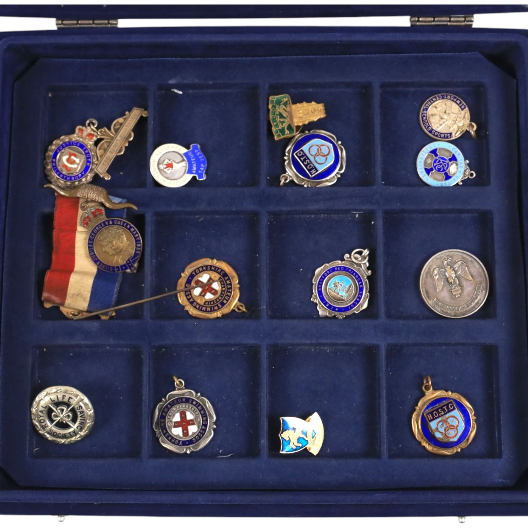 Collection of badges, medals, medallions, coin broches, two lead Great Seals, etc, in Westminster box
