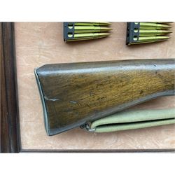 WW2 Lee Enfield No.4 Mk.1 .303 bolt-action rifle with hinged butt compartment, made by SA Ltd., Long Branch, Canada 1942, serial no.5L0646 L113cm; mounted on a framed display board with No.4 Mk.II spike bayonet, No.9 Mk.1 blade bayonet, two inert 5-round clips and brass biographical plaque by Antler Military Originals detailing DA Cert No.C3444 OLD STYLE DEACTIVATION SO FIREARMS CERTIFICATE REQUIRED OR RFD