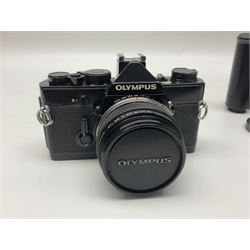 Olympus OM-1 camera body, serial no 913212, with 'Olympus OM-System F.Zuiko Auto-S 1:1.8 f=50mm' lens, serial no.74374, 'Vivitar wide angle MC 28mm 1:2.8 49mm' lens, serial no. 42042268, and Olympus OM winder 2