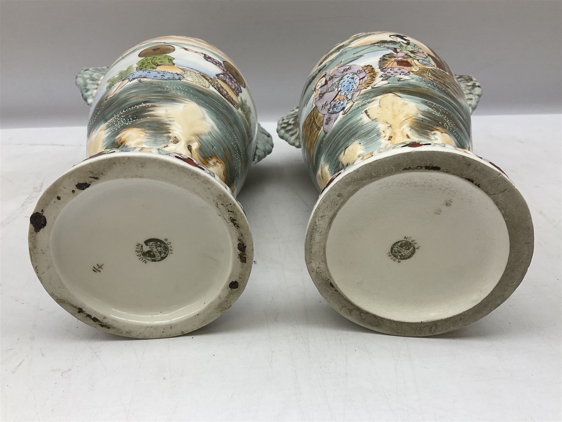 Pair of Royal Nippon Nishki lidded vases, decorated in Oriental style