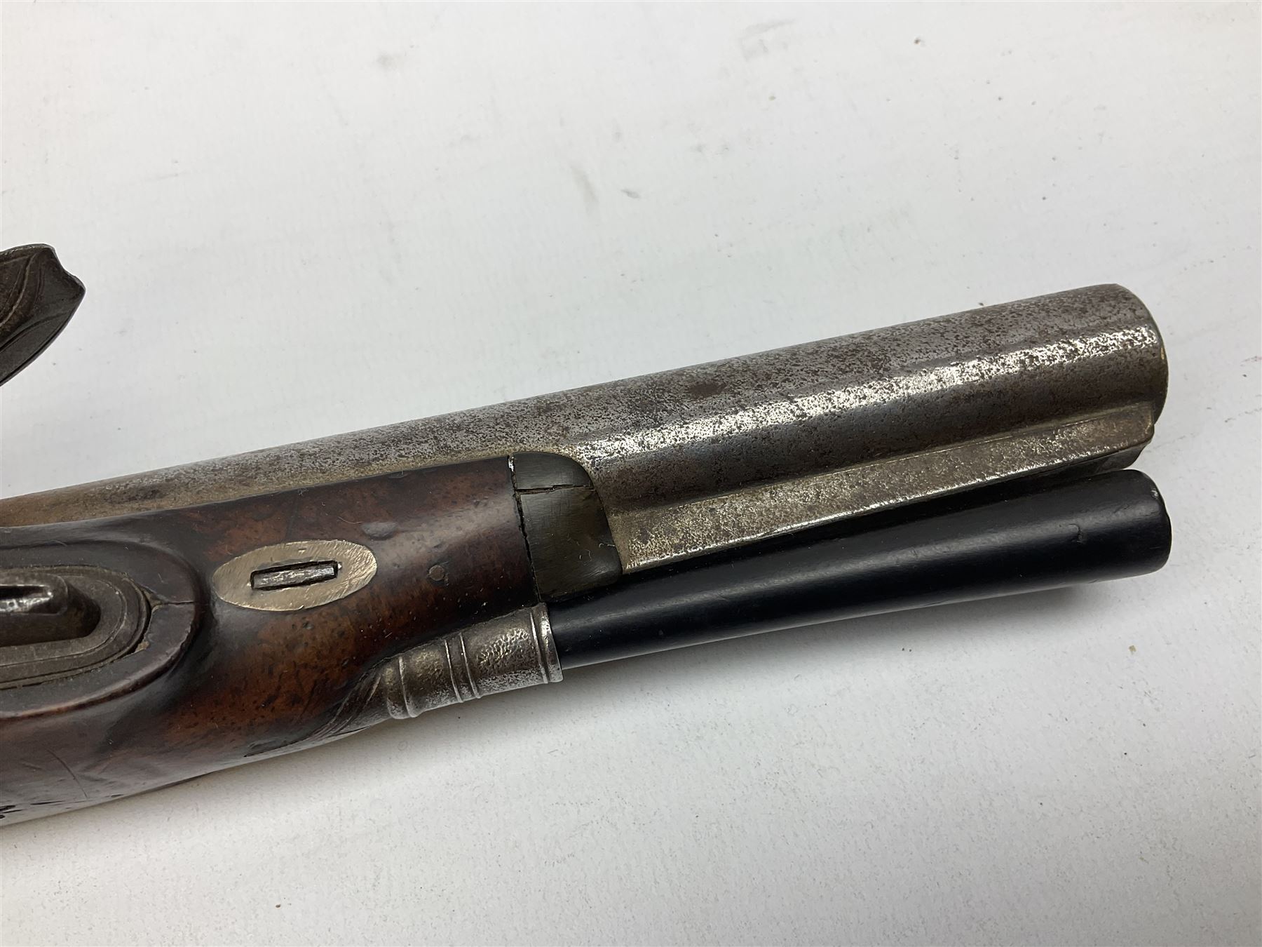 Early 19th century flintlock pistol by George Wallis Hull, the 16cm barrel with ram rod under, chequered walnut stock with sunburst engraved German silver butt cap and horn fore-ends, engraved steel furniture with pineapple finial, gold poincon for Hull to top of barrel and for Wallis to lock plate 30cm overall
