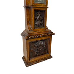 J Hicks - Hatton Garden London, - late 19th century carved oak cased Fitzroy barometer in a richly carved case with a carved crested pediment and square cistern cover, inverted opaline register reflecting FitzRoy's predictions and a scale from 27 to 31 inches of barometric pressure, with a thick bore cistern tube and adjustable rack and pinion twin vernier, fitted with a glazed snail bulb mercury thermometer recording the air temperature in both Fahrenheit and Celsius. Mercury clean and present.
James Joseph Hicks was born in Ireland, however, early in his life he moved to London where he was apprenticed to the instrument maker Louis P Casella. In 1860 he went into business in his own right as a scientific instrument maker at 8 Hatton Gardens. In 1864 he was granted membership to the British Meteorological Society and exhibited instruments at the Royal Society Exhibitions between 1876 and 1913. Hicks was one of London's most prolific and eminent barometer makers. 