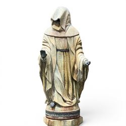 Farran stone garden statue depicting a hooded monk standing in flowing robes in circular form, set upon Gothic pedestal with arched panels, featuring lead hands and script band