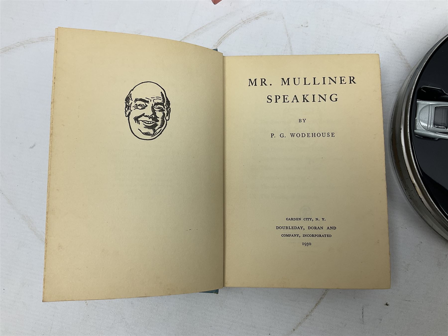 Wodehouse P.G.: Mr. Mulliner Speaking. First American edition 1930; eighteen P.G. Wodehouse paperback books; fourteen James Bond paperback books and Corgi tin of four James Bond die-cast model cars