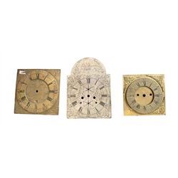 Six clock dials and an engraved brass chapter ring.
Comprising of four 18th century brass longcase dials with two painted wall clock dials and an 18th century engraved single-handed brass chapter ring.