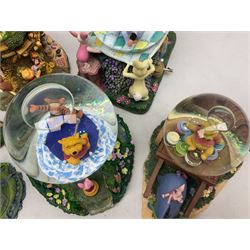 Five Disney Winnie The Pooh snow globes to include The Rain Rain Rain Came Down Down Down, Eeyore Pulling Cart, Owl's House, Rumbly in My Tumbly and Stuck In Rabbit's House, together with figure group with dome, five with boxes (6)